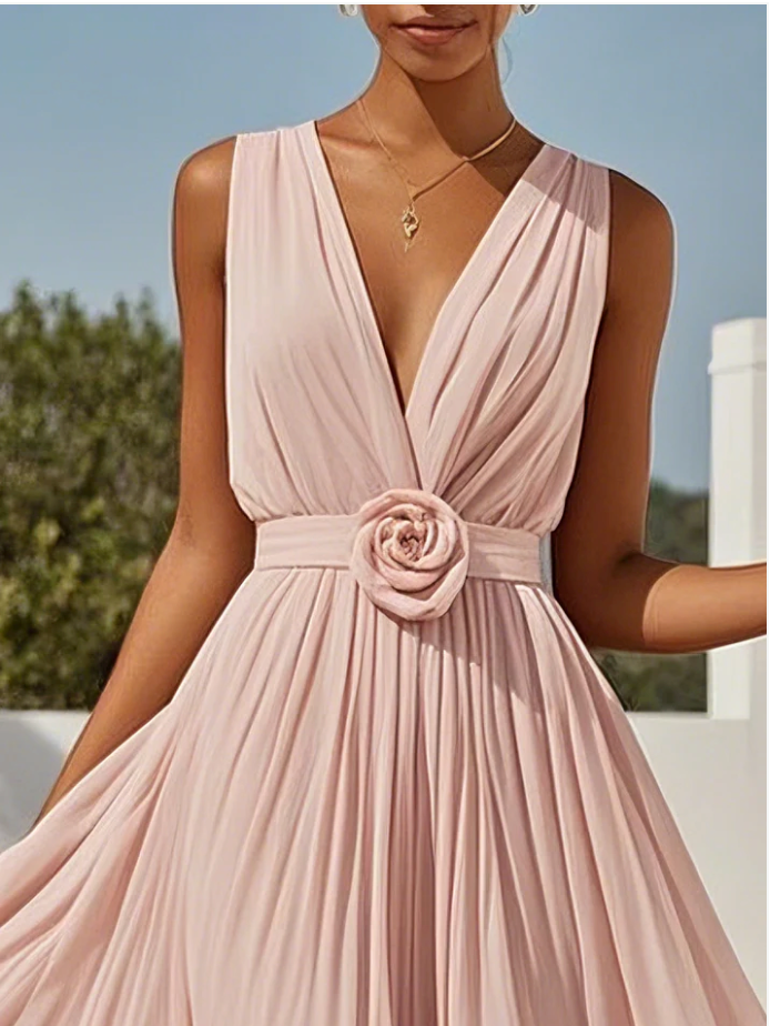 Abito lungo rosa a trapezio senza maniche in chiffon plissettato con scollo a V e stampa floreale 3D.