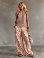 Set Bianca due pezzi composto da top rosa chic ed elegante con scollo all'americana