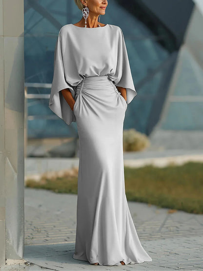 Clara | Abito elegante con scollo a V, schiena scoperta e maniche