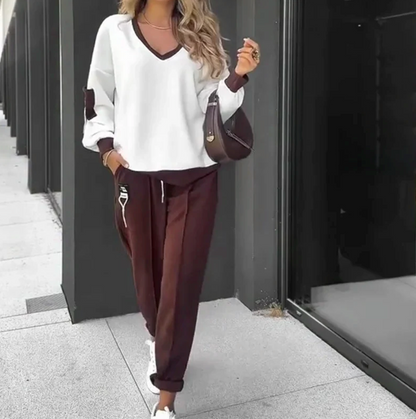 Completo composto da felpa con cappuccio e pantaloni da jogging a blocchi di colore