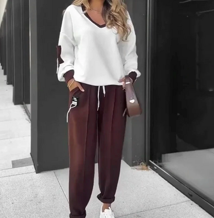 Completo composto da felpa con cappuccio e pantaloni da jogging a blocchi di colore