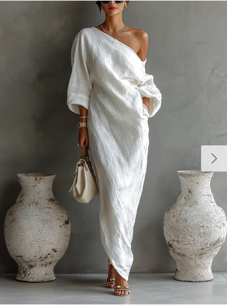 Abito lungo bianco monospalla, elegante e svolazzante