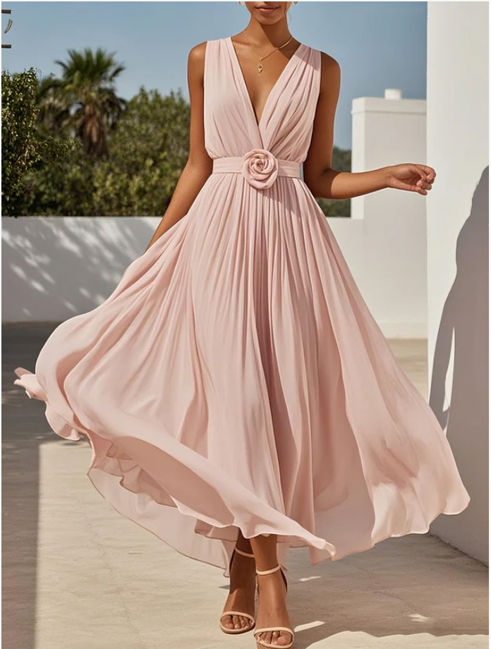 Abito lungo rosa a trapezio senza maniche in chiffon plissettato con scollo a V e stampa floreale 3D.