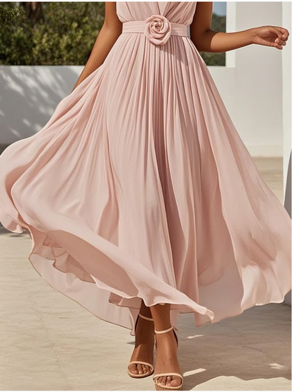 Abito lungo rosa a trapezio senza maniche in chiffon plissettato con scollo a V e stampa floreale 3D.