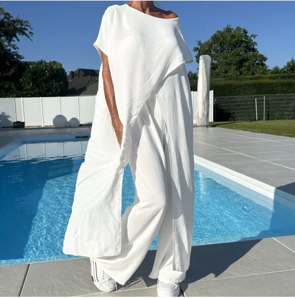 Completo top a spalle scoperte e pantaloni in tinta unita