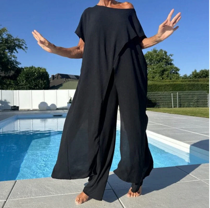 Completo top a spalle scoperte e pantaloni in tinta unita