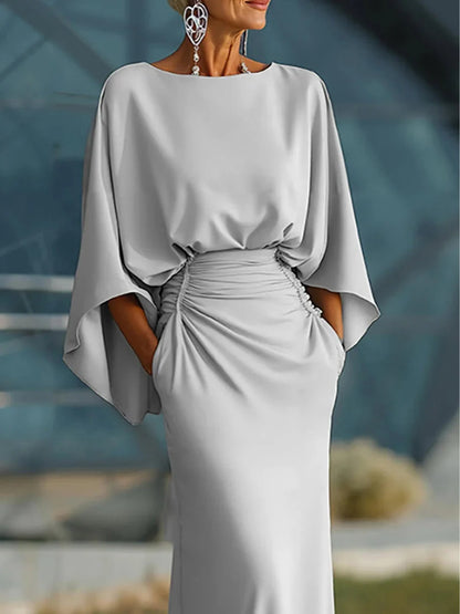 Clara | Abito elegante con scollo a V, schiena scoperta e maniche