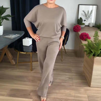 Elegante completo a 3 pezzi composto da cardigan lungo, top e pantaloni.