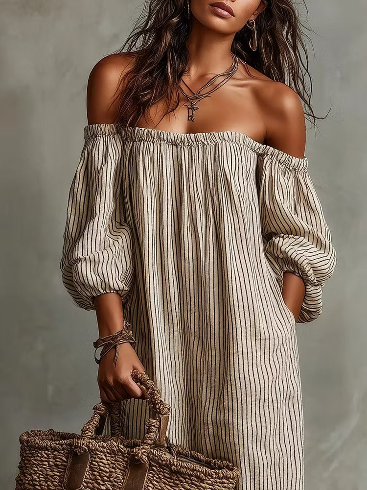 Abito lungo a maniche lunghe con spalle scoperte e righe beige, ideale per le vacanze.