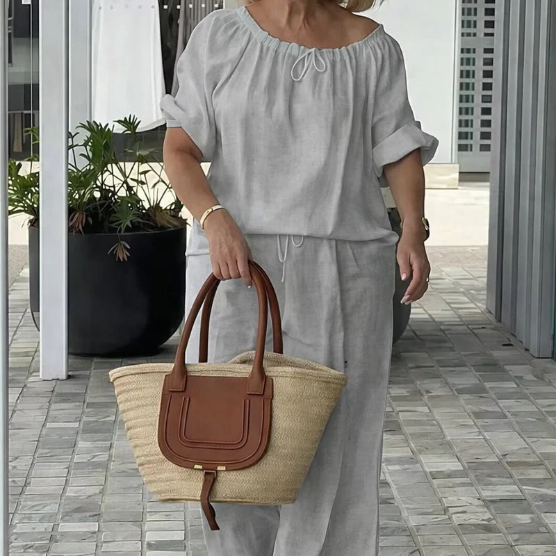 Completo da donna a due pezzi con coulisse: top e pantaloni
