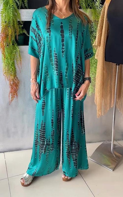 Completo due pezzi casual in raso con scollo rotondo
