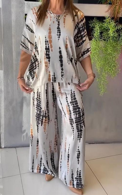 Completo due pezzi casual in raso con scollo rotondo