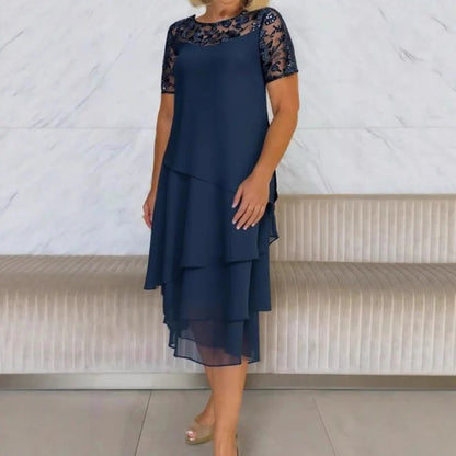 vestito tourbillon con ricami in pizzo brillantinati