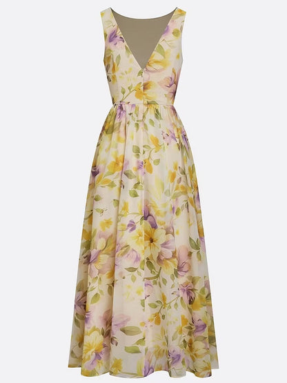 Abito lungo a trapezio senza maniche in chiffon giallo con scollo a barca e stampa floreale