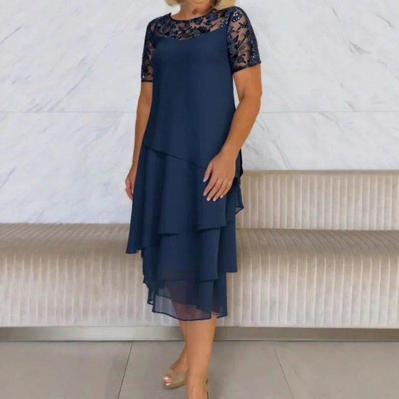 vestito tourbillon con ricami in pizzo brillantinati