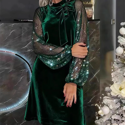 Abito da donna con paillettes e scollo a fiocco