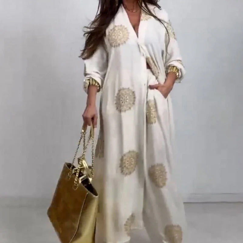 Completo da donna composto da top ampio con scollo a V e pantaloni a gamba larga stampati🌺