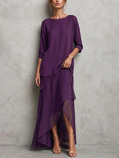 Set composto da top casual ampio a tinta unita con scollo rotondo e maniche a tre quarti e gonna a trapezio a vita alta