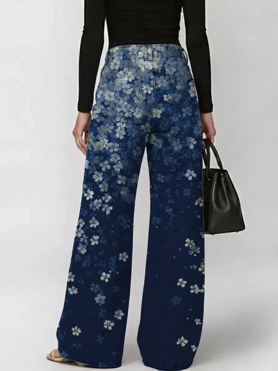 Jeans da donna casual alla moda con stampa floreale sfumata vintage e ritagli.