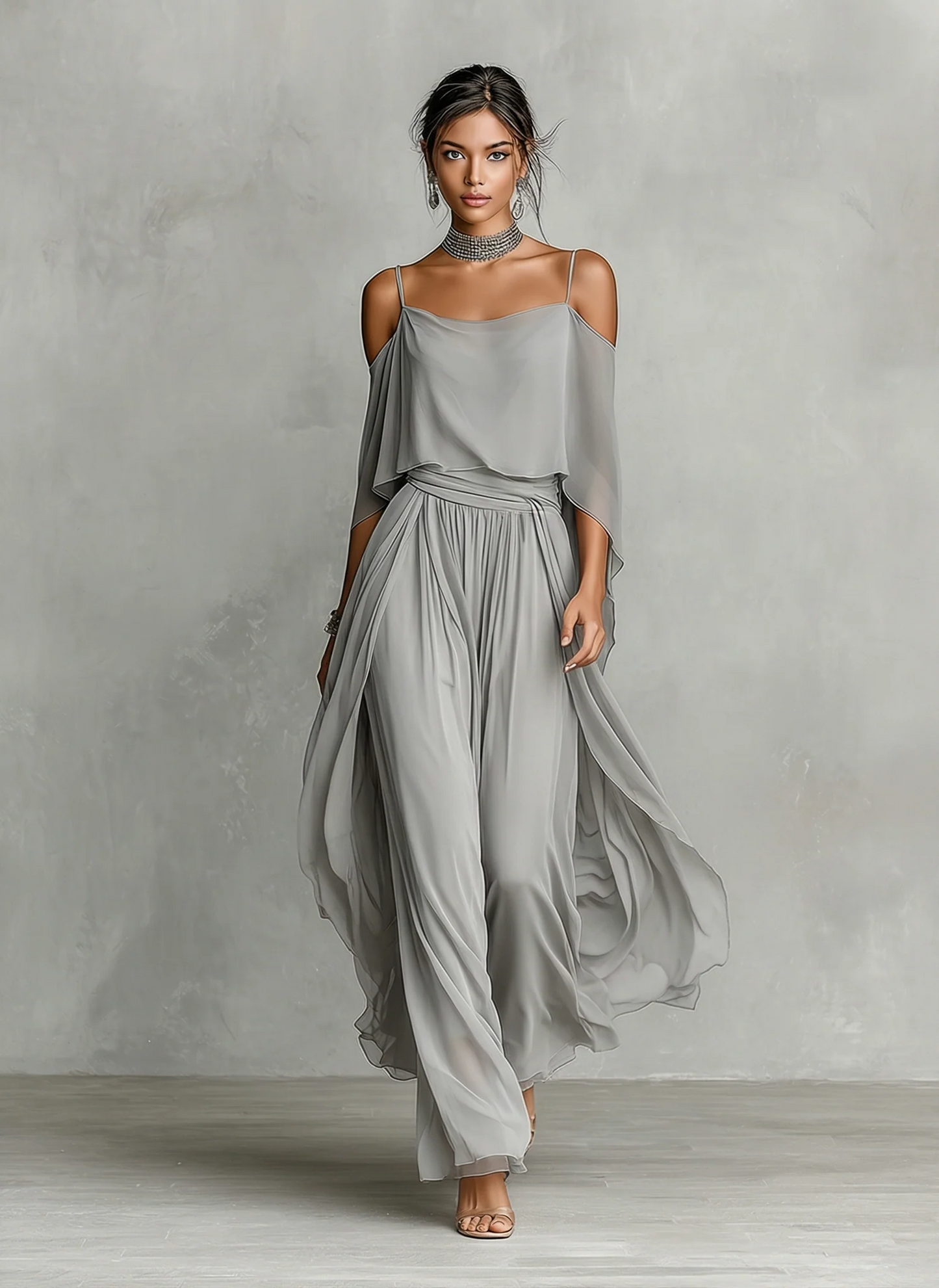 Completo in chiffon grigio traspirante con spalle scoperte e linea svasata, uno stile contemporaneo, lussuoso e femminile