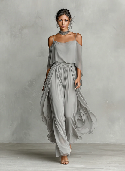 Completo in chiffon grigio traspirante con spalle scoperte e linea svasata, uno stile contemporaneo, lussuoso e femminile