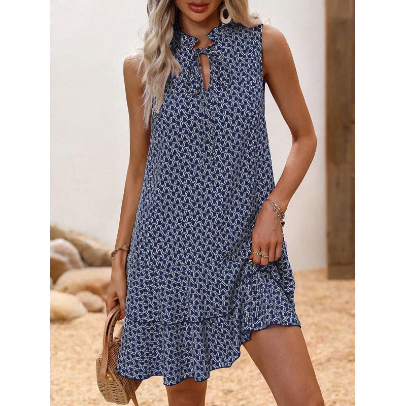 Abito da donna con fiocco e motivo geometrico