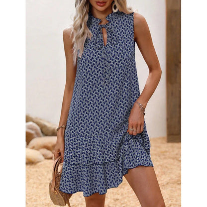 Abito da donna con fiocco e motivo geometrico