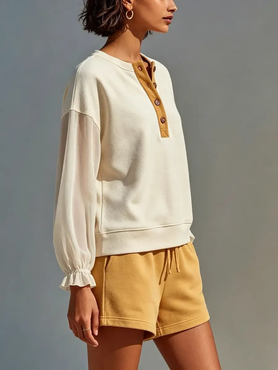 Completo casual da donna con felpa e pantaloncini eleganti