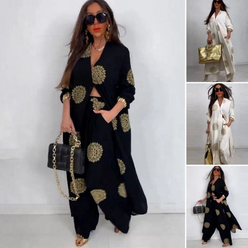 Completo da donna composto da top ampio con scollo a V e pantaloni a gamba larga stampati🌺