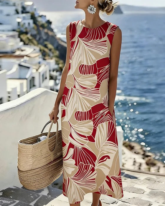 Abito senza maniche color albicocca con foglie di ginkgo
