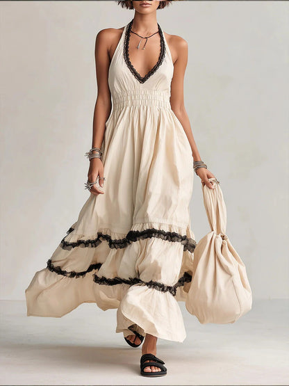 Abito lungo da donna con scollo all'americana e scollo a V, con inserti in pizzo.