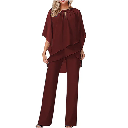 Elegante completo a due pezzi: camicetta con orlo asimmetrico e pantaloni larghi
