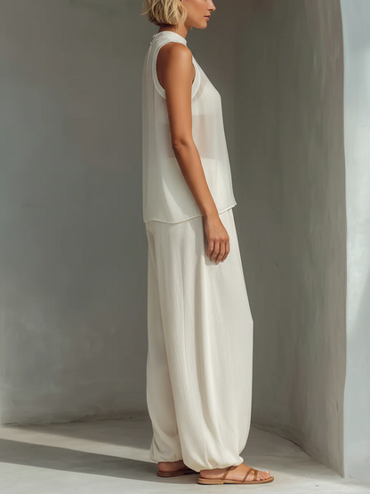 Completo da donna color crema composto da top senza maniche e pantaloni a gamba larga lino