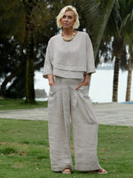 Completo da donna in lino con top asimmetrico e slip
