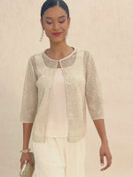 Twinset con scollo rotondo e maniche a 3/4 in rete e paillettes