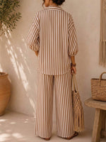 Set elegante in misto cotone e lino con stampa a righe: top dalla vestibilità, e pantaloni a vita alta a gamba larga