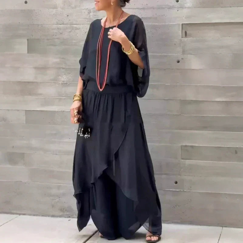 Set Isabel a due pezzi in chiffon con top ampio e pantaloni a zampa con spacco