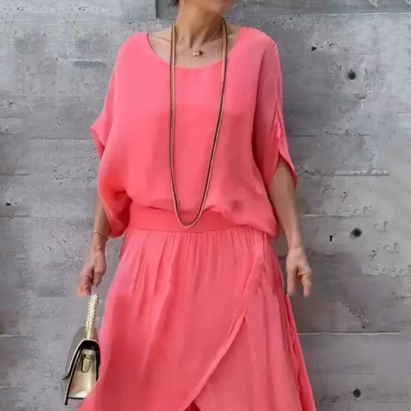 Set Isabel a due pezzi in chiffon con top ampio e pantaloni a zampa con spacco