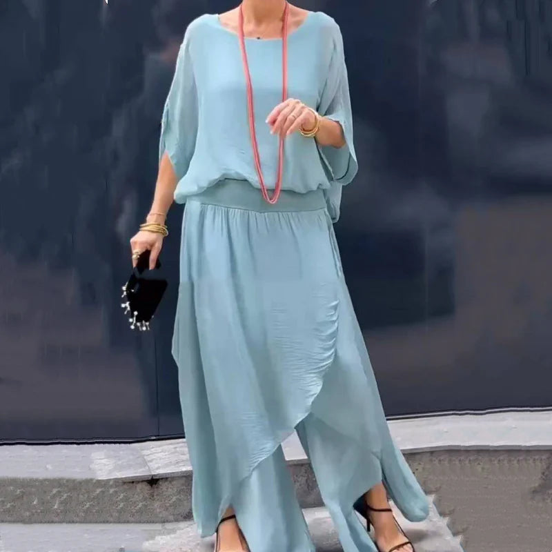 Set Isabel a due pezzi in chiffon con top ampio e pantaloni a zampa con spacco