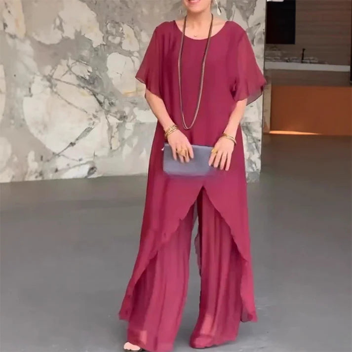 💃 Set composto da top asimmetrico e pantaloni larghi ✨