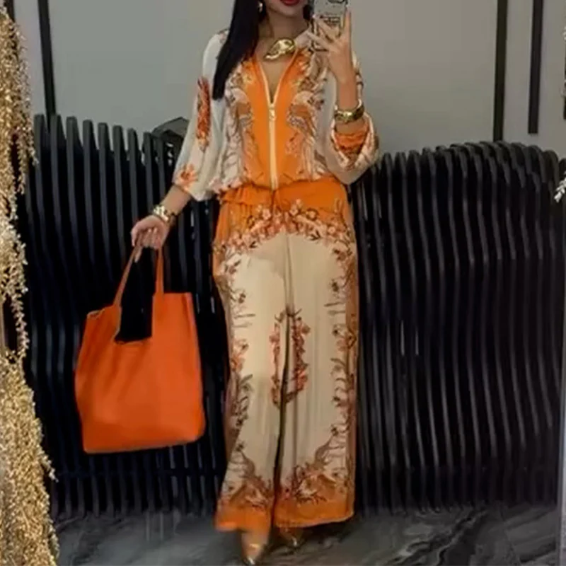 Set Giada composto da top con cerniera stampato e pantaloni a zampa