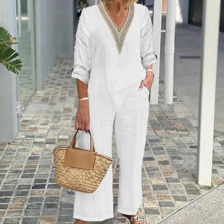 Top LARA con scollo a V e pantaloni a zampa per donna
